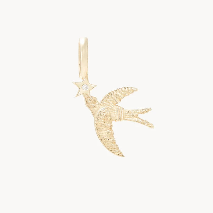 Starbound Swallow Bird Charm in 10k yellow gold with brilliant diamond