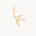 Starbound Swallow Bird Charm in 10k yellow gold with brilliant diamond