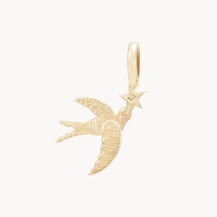 Starbound Swallow Bird Charm in 10k yellow gold with brilliant diamond, alternate angle detail view 2