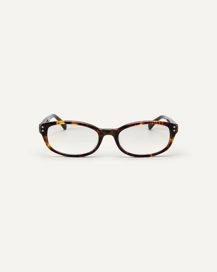 Face shot of Bonnie Clyde Sudoku optical frames in tortoise with clear lenses.