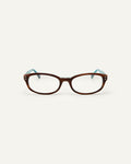 Face shot of Bonnie Clyde Sudoku optical frames in layered teal demi with clear lenses.