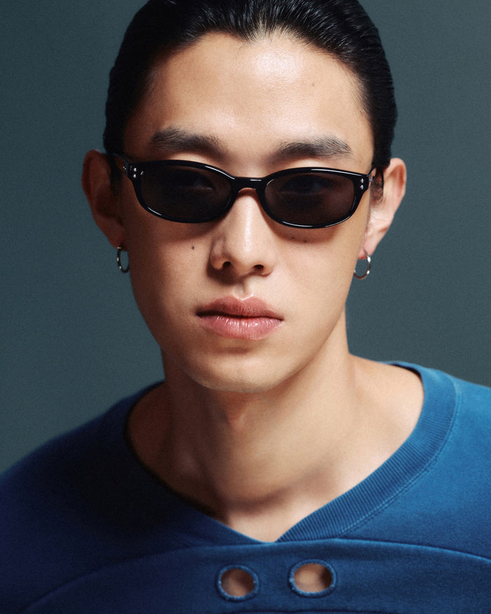 Quarter shot of Bonnie Clyde Sudoku sunglasses in black with black lenses.