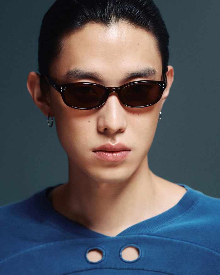 Quarter shot of Bonnie Clyde Sudoku sunglasses in red tortoise with brown lenses.