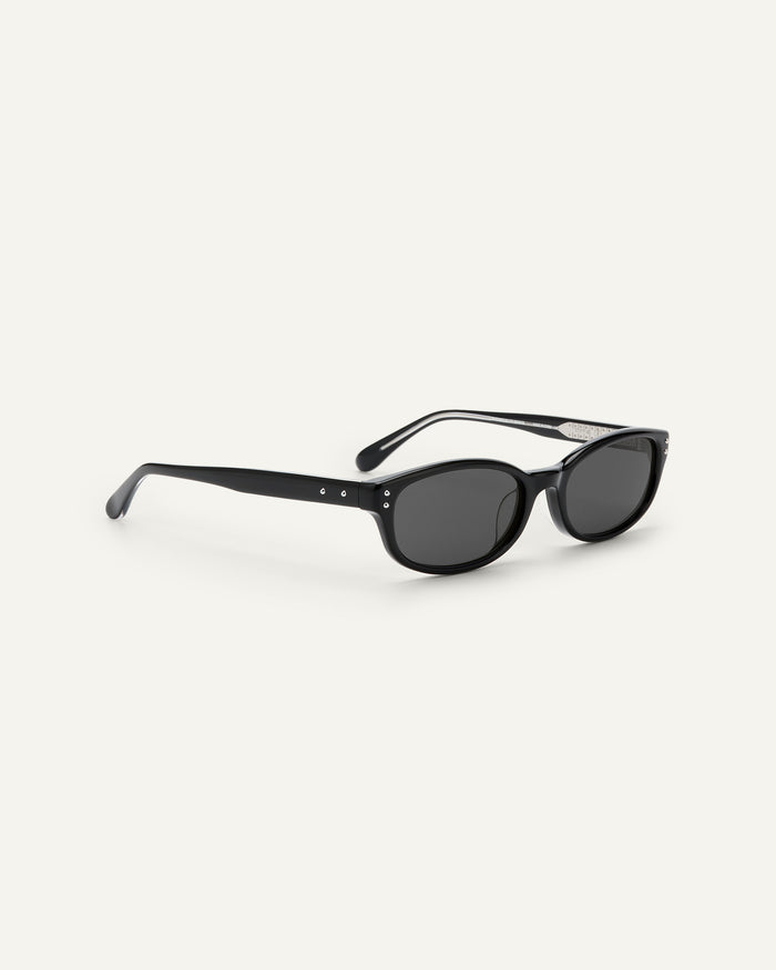 Side shot of Bonnie Clyde Sudoku sunglasses in black with black lenses.