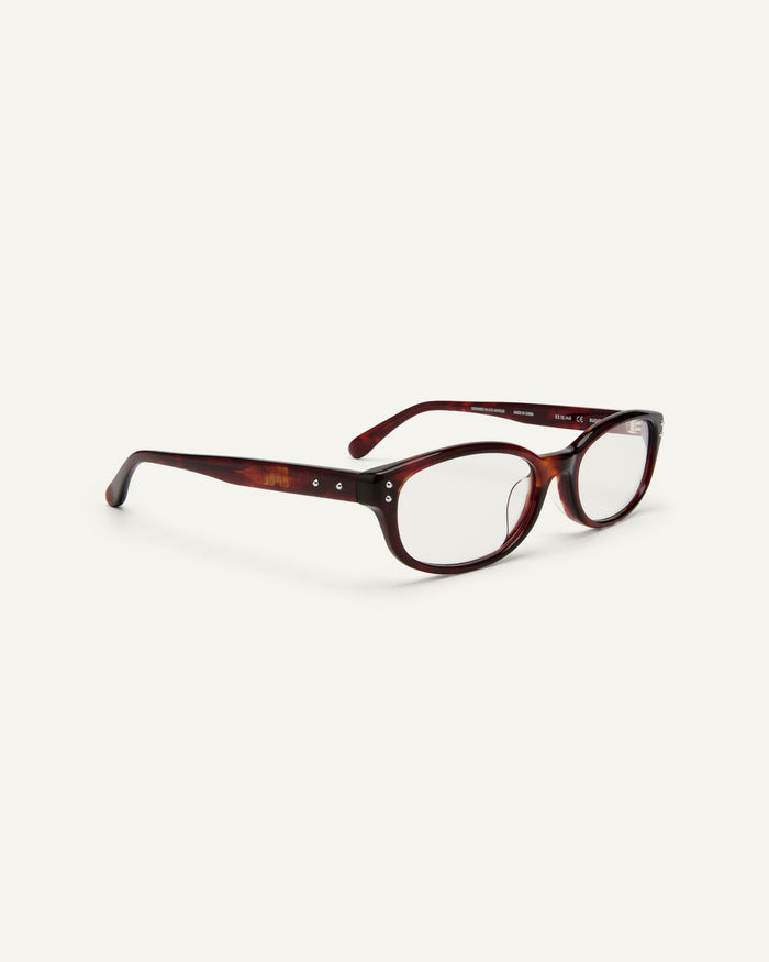Side shot of Bonnie Clyde Sudoku optical frames in red tortoise with clear lenses.
