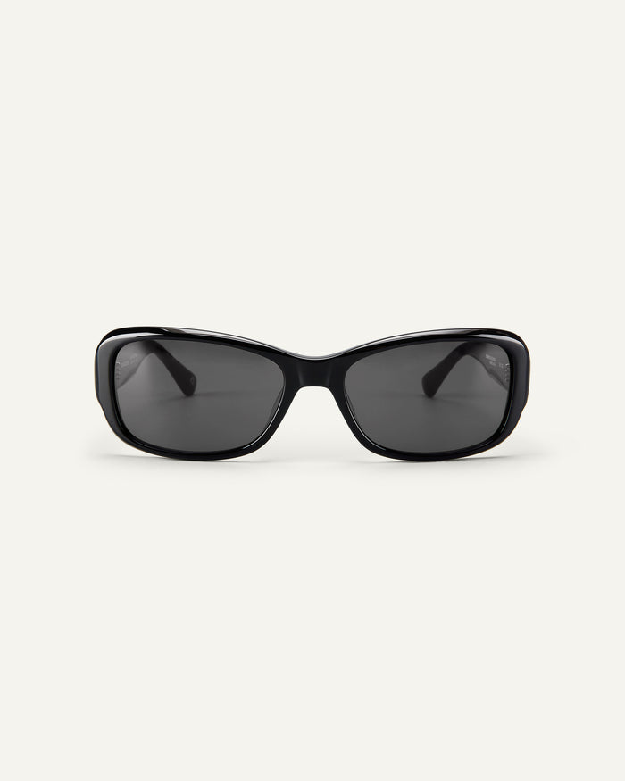 Face shot of Bonnie Clyde Sugar sunglasses in black with black lenses.