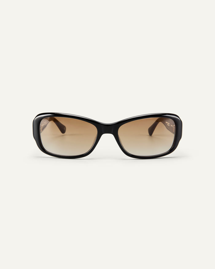 Face shot of Bonnie Clyde Sugar sunglasses in black with brown lenses.