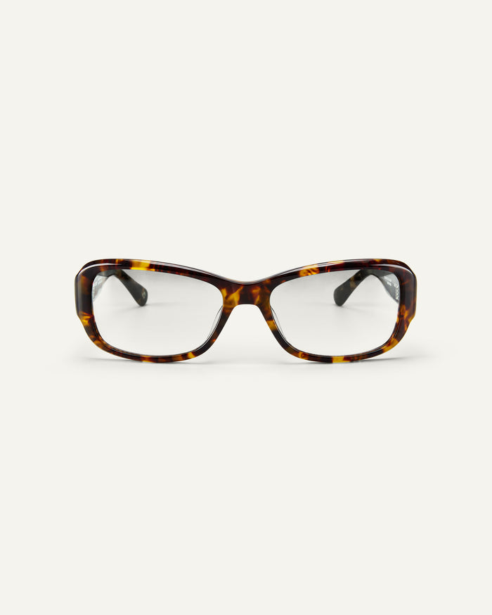 Face shot of Bonnie Clyde Sugar optical frames in tortoise with clear lenses.