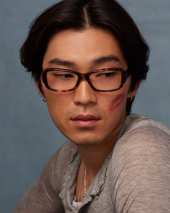 Quarter shot of Bonnie Clyde Sugar optical frames in tortoise with clear lenses.
