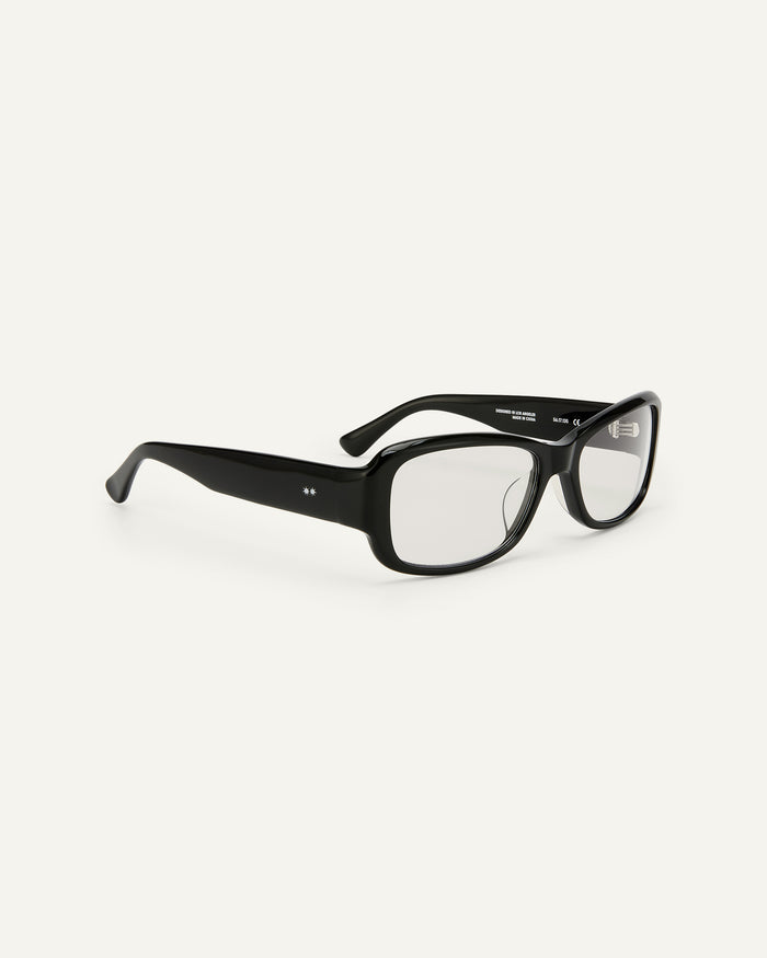 Side shot of Bonnie Clyde Sugar optical frames in black with clear lenses.