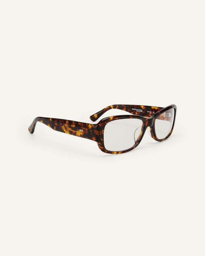 Side shot of Bonnie Clyde Sugar optical frames in tortoise with clear lenses.