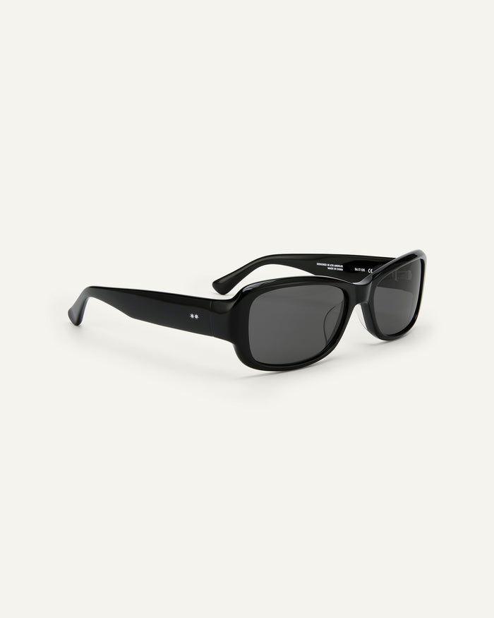 Side shot of Bonnie Clyde Sugar sunglasses in black with black lenses.