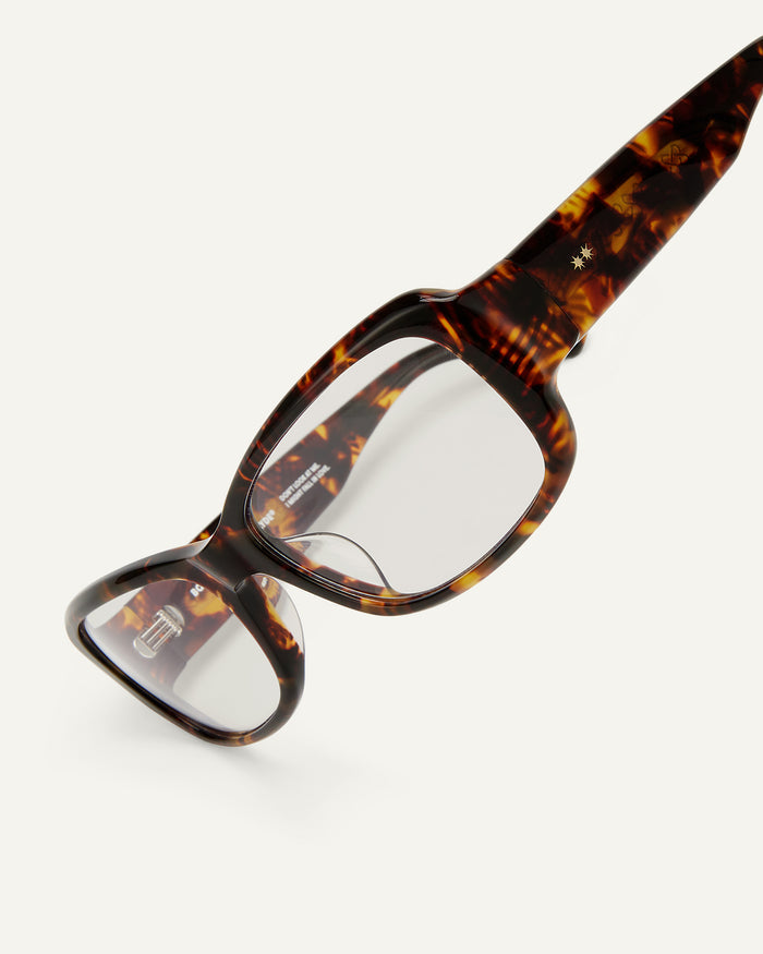 Close-up shot of Bonnie Clyde Sugar optical frames in tortoise with clear lenses.