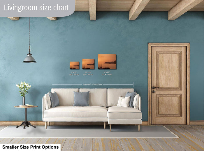 a living room with a white sofa, a wooden door, and a hanging light fixture. There are three framed prints displayed on the wall, each with different sizes and dimensions. The text "Livingroom size chart" is visible, indicating that this is a chart or diagram related to the living room's size and dimensions.