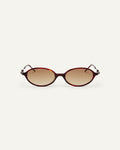Face shot of Bonnie Clyde Swimming sunglasses in black and red tortoise with brown gradient lenses.