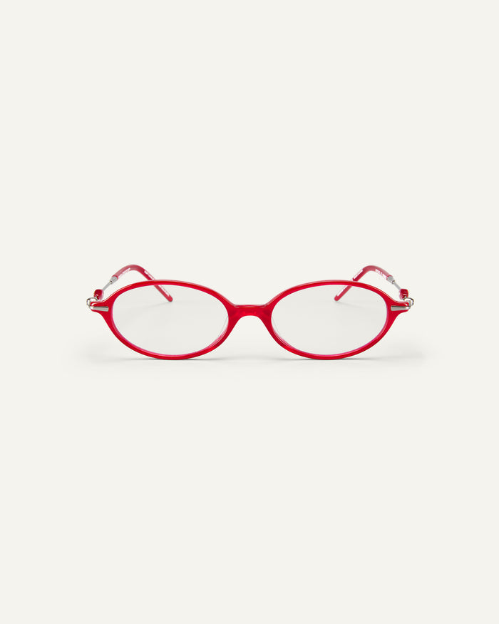 Face shot of Bonnie Clyde Swimming optical frames in silver and layered red with clear lenses.
