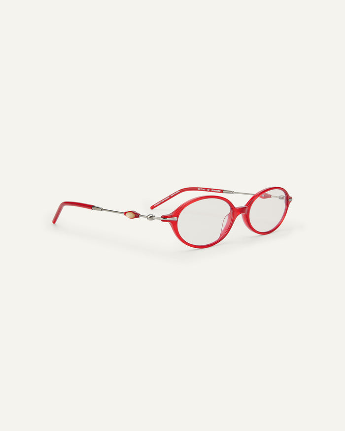 Side shot of Bonnie Clyde Swimming optical frames in silver and layered red with clear lenses.