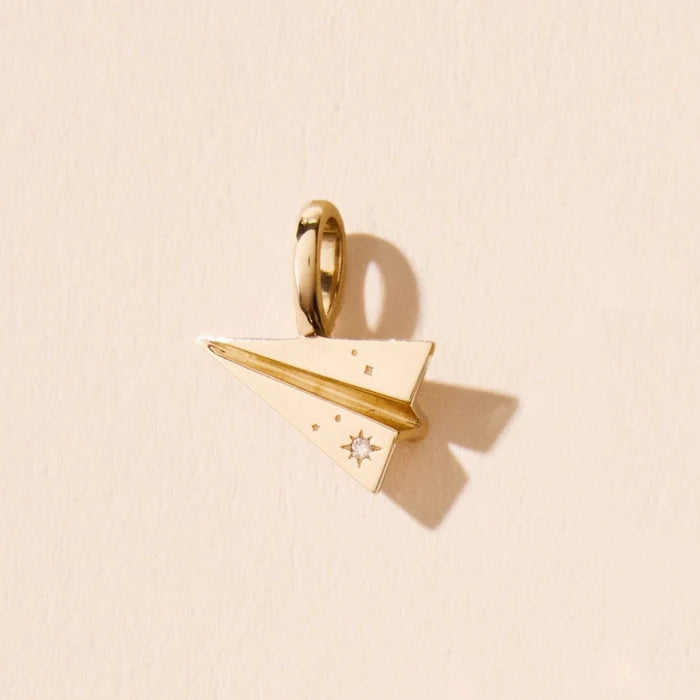 Take Flight Paper Plane Charm in 10k yellow gold with brilliant diamond, alternate angle detail view