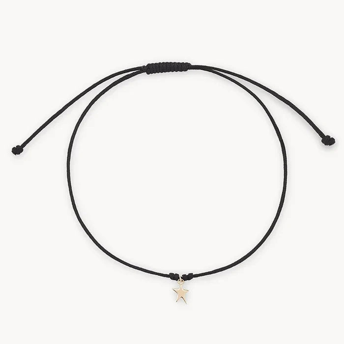 The Bright Star Contemplation Cord Bracelet in 10k yellow gold with black cord