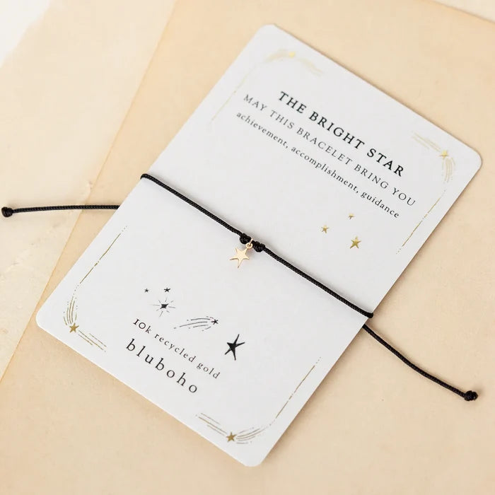 The Bright Star Contemplation Cord Bracelet in 10k yellow gold with black cord, alternate angle detail view 2
