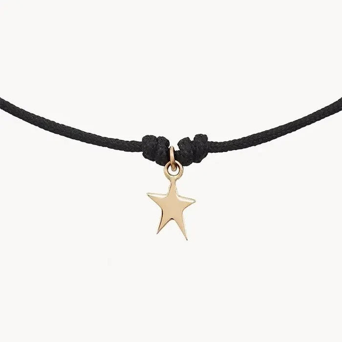 The Bright Star Contemplation Cord Bracelet in 10k yellow gold with black cord, alternate angle detail view 3