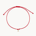 The Deep Love Contemplation Cord Bracelet in 10k yellow gold with red cord