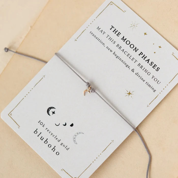 The Moon Phases Contemplation Cord Bracelet in 10k yellow gold with grey cord, alternate angle detail view 2