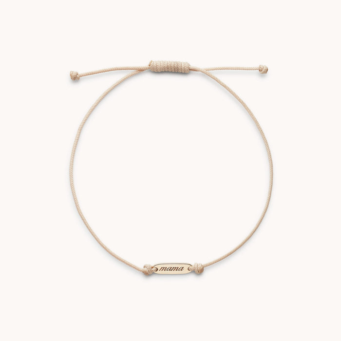 The Mother Contemplation Cord Bracelet in 10k yellow gold with cream cord