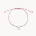The Open Heart Cord Bracelet in sterling silver with diamond and light pink cord
