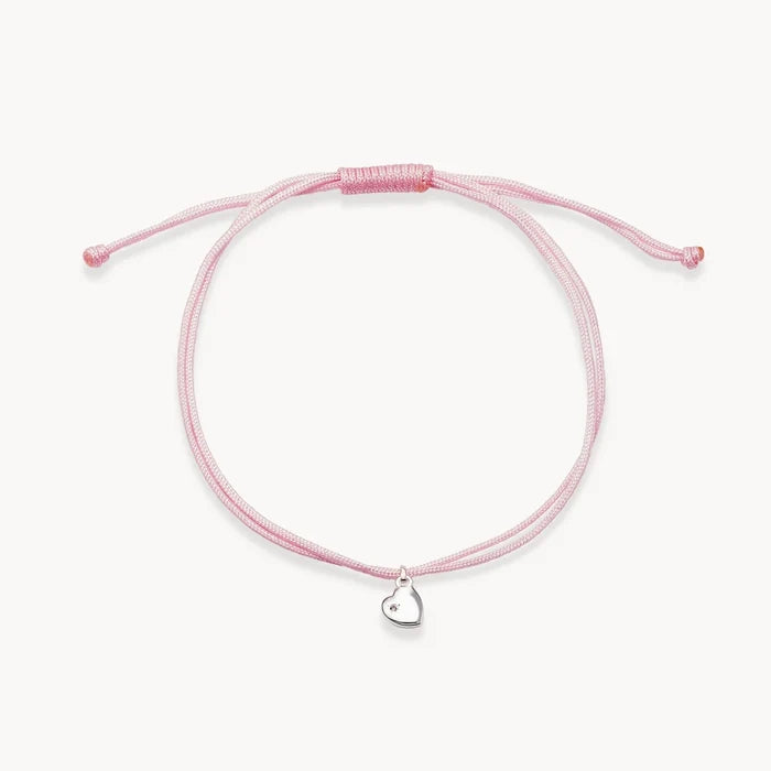 The Open Heart Cord Bracelet in sterling silver with diamond and light pink cord