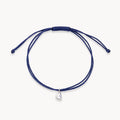 The Open Heart Cord Bracelet in sterling silver with diamond and soft blue cord