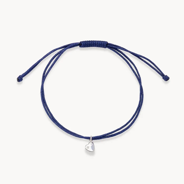 The Open Heart Cord Bracelet in sterling silver with diamond and soft blue cord