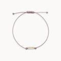 The Wild Heart Cord Bracelet in 10k yellow gold with lavender cord
