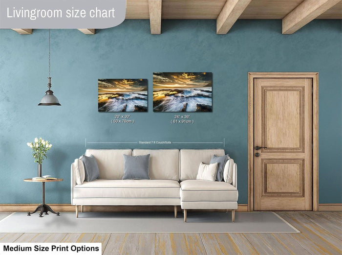 a living room with a white sofa, a wooden door, and a painting of a sunset on the wall. The living room appears to be designed for relaxation and comfort, with a focus on the artwork and the overall aesthetic.