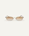 Face shot of Bonnie Clyde Tiptoe sunglasses in silver with brown lenses.