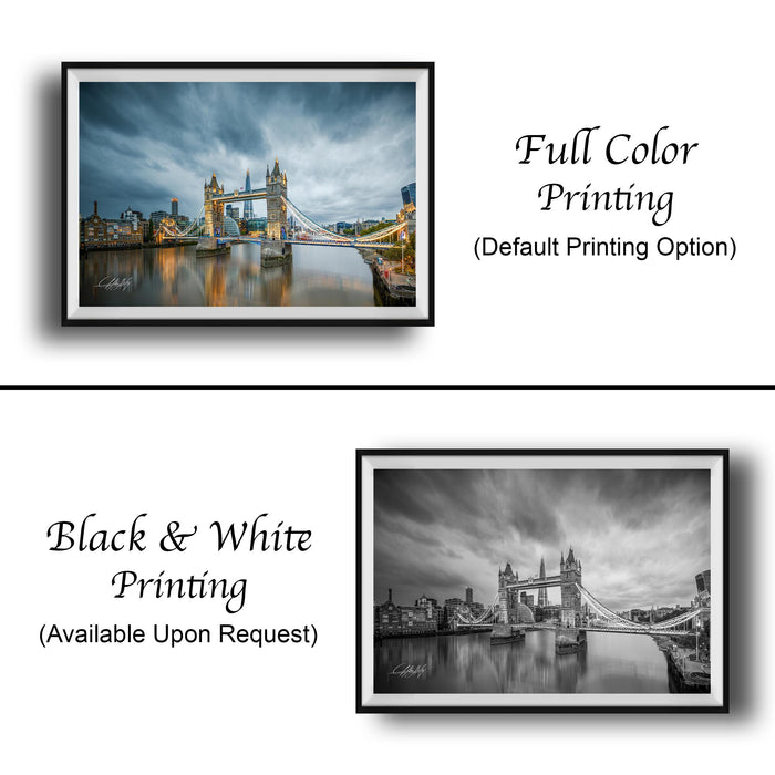 The image is a collage of two framed pictures, one in black and white and the other in full color. The black and white picture depicts a city skyline, while the full color picture shows a bridge and the city skyline. Both pictures are framed and available upon request.