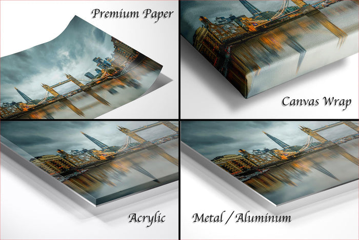 four different views of a printed artwork depicting a cityscape, with the artwork appearing in various materials such as acrylic, metal, and aluminum.