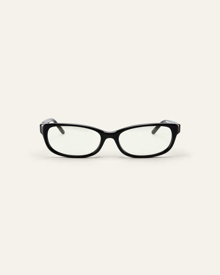 Face shot of Bonnie Clyde Trinket sunglasses in black with clear lenses.