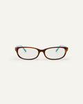 Face shot of Bonnie Clyde Trinket sunglasses in layered teal demi with clear lenses.