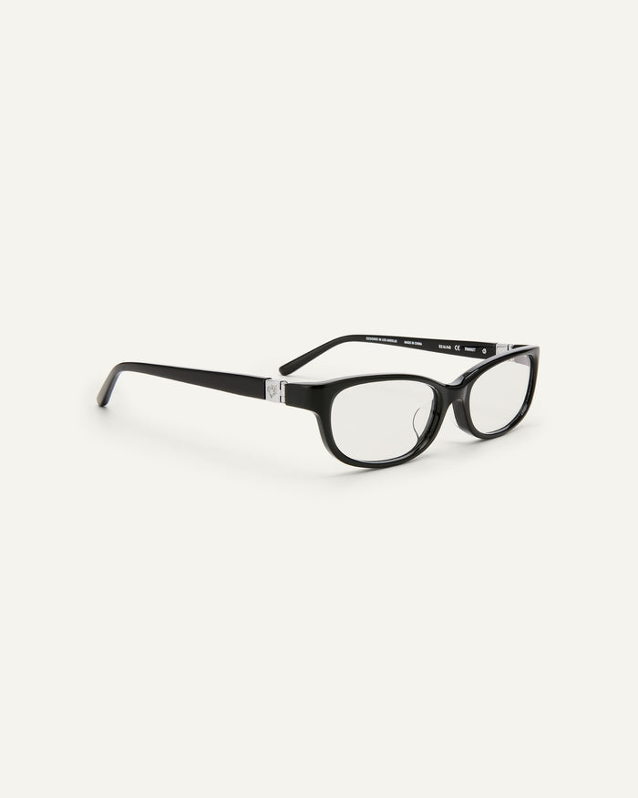 Quarter shot of Bonnie Clyde Trinket sunglasses in black with clear lenses.