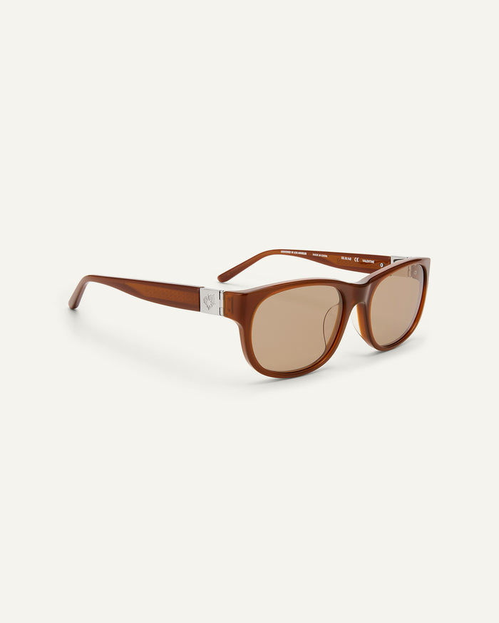 Quarter shot of Bonnie Clyde Valentine sunglasses in cloudy brown with brown lenses.