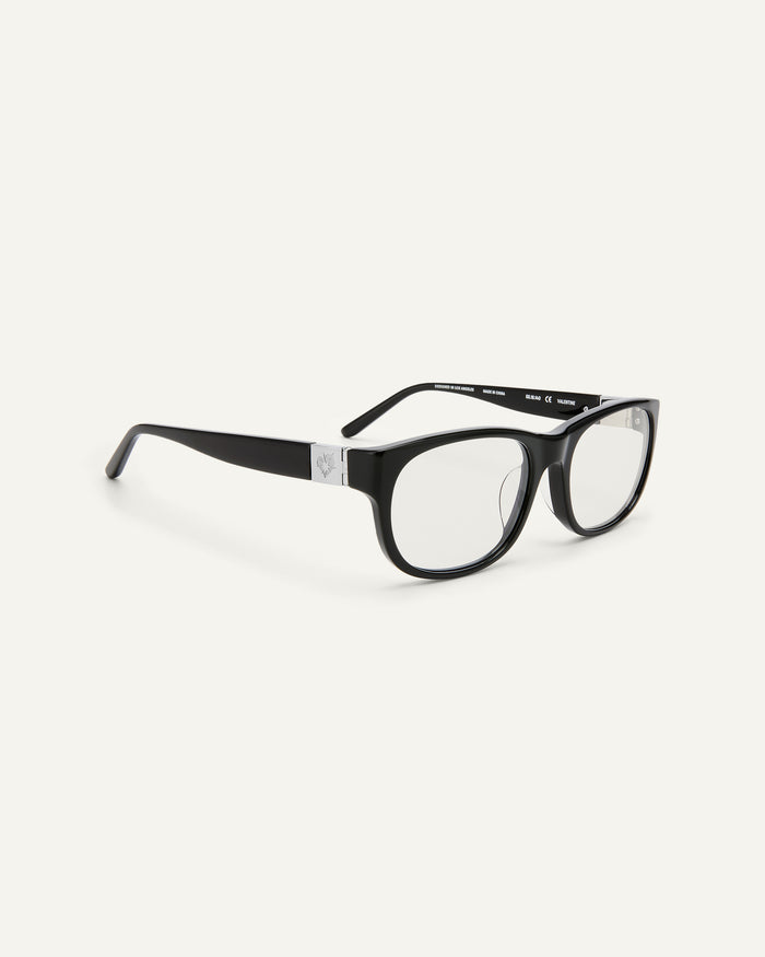Quarter shot of Bonnie Clyde Valentine sunglasses in black with clear lenses.