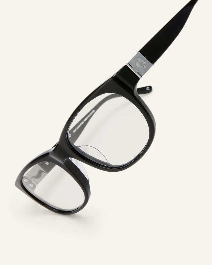 Side shot of Bonnie Clyde Valentine sunglasses in black with clear lenses.