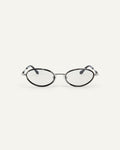 Face shot of Bonnie Clyde Voodoo optical frames in silver and black tortoise with clear lenses.