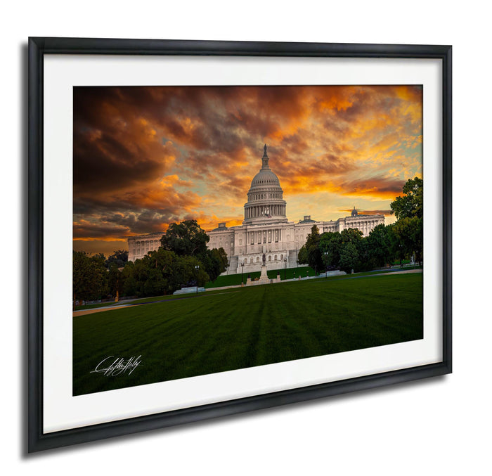 the United States Capitol building in Washington D.C., with a dramatic sky in the background featuring orange and red hues.