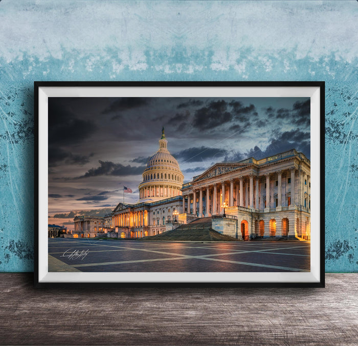 the United States Capitol building in Washington D.C., with its iconic dome and columns illuminated against a dramatic sky.