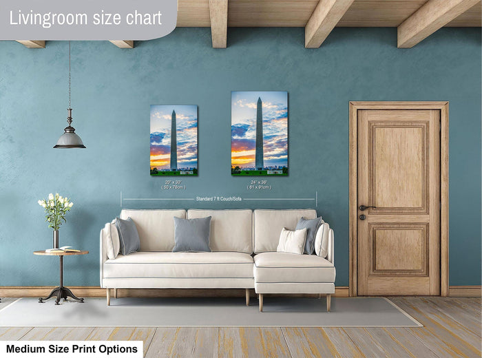 a living room with a white sofa, a wooden door, and a painting of the Washington Monument on the wall.