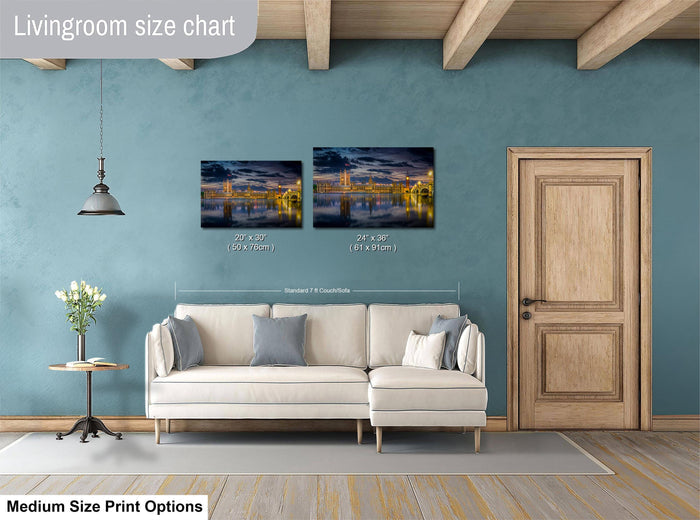 a living room with a white sofa, a wooden door, and a painting of a cityscape on the wall. The painting is of a medium size, and the living room appears to be designed for a comfortable and relaxing atmosphere.