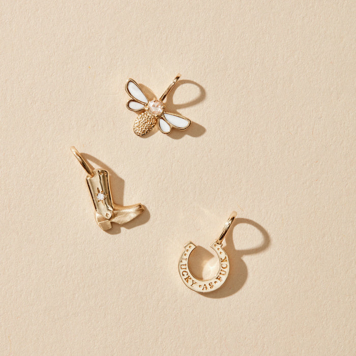 Wild Luck Horseshoe Charm in 10k yellow gold with diamond, alternate angle detail view