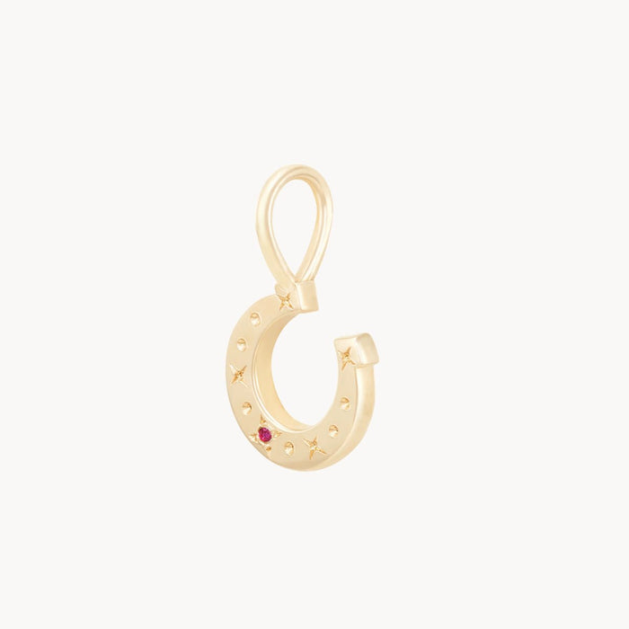 Wild Luck Horseshoe Charm in 10k yellow gold with ruby, alternate angle detail view 3